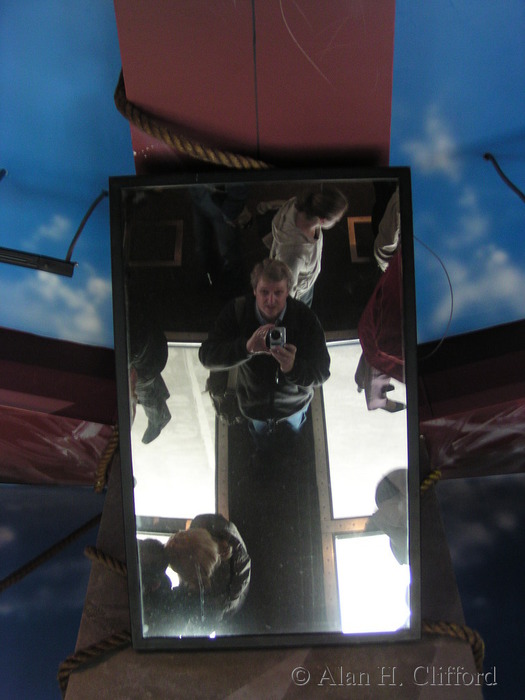 Alan in the mirror above the glass floor, CN tower, Toronto