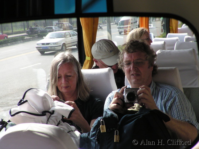 Margaret and Alan reflected in the mirror in the coach in Xi’an