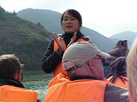Our guide sings on the Shennong boat