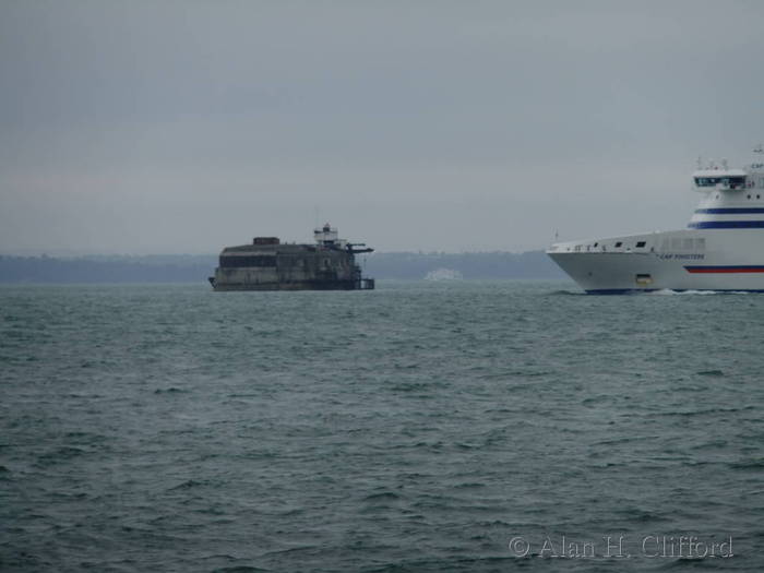 A ferry passing Spitbank Fort in the Solent