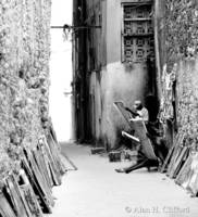 Artists in a Stonetown alley